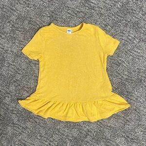 Super soft yellow tee with ruffles on the bottom